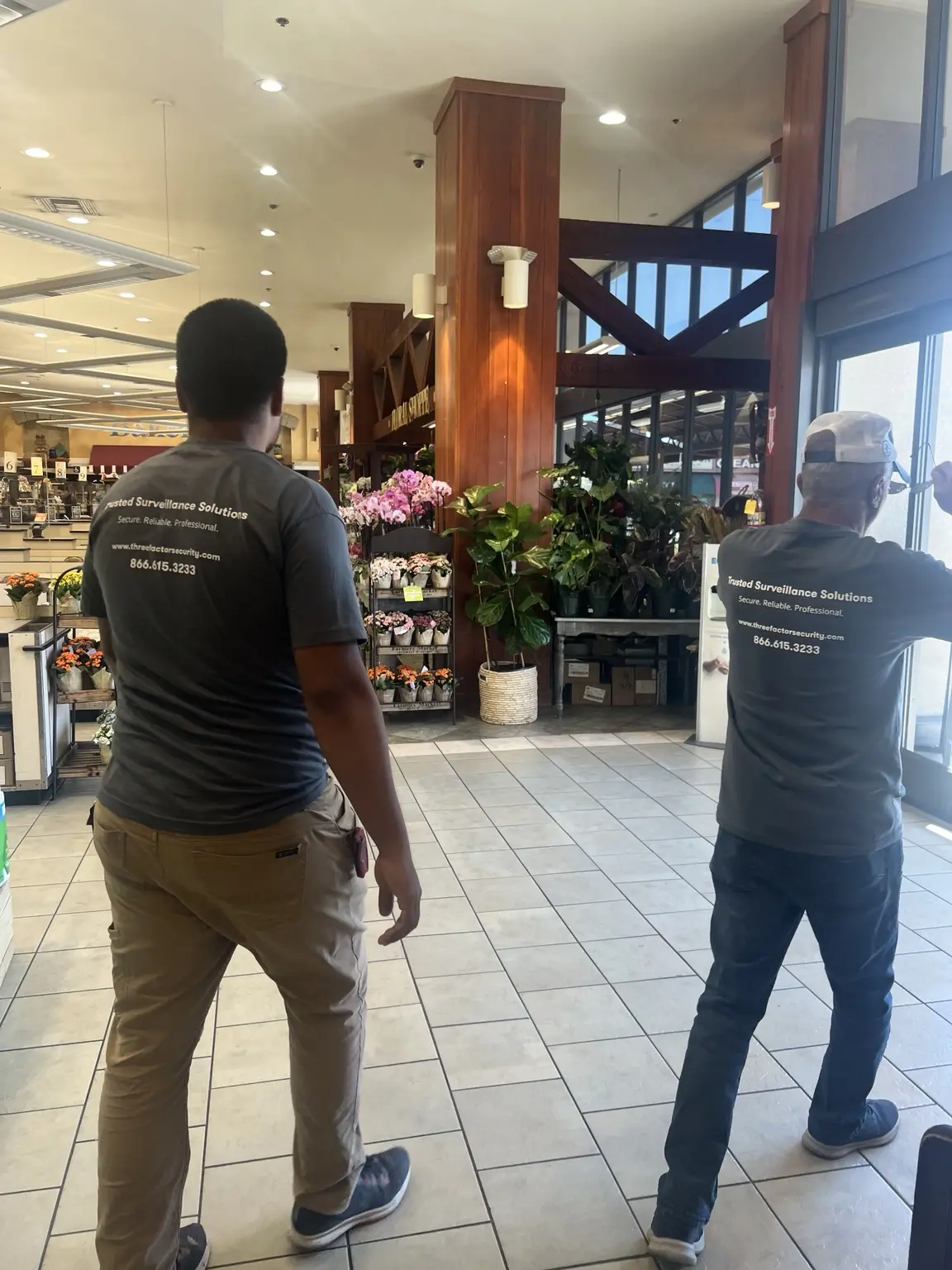Three Factor Security technicians walking an active commercial property during a site assessment — Three Factor Security fieldwork in Torrance